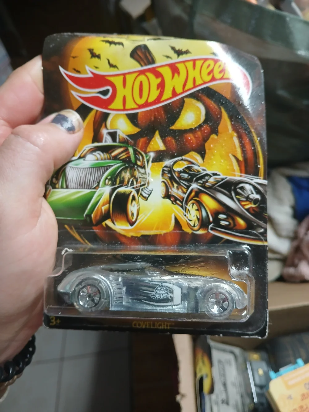 Hot Wheels Covelight Halloween themed series,  silver/clear Car Pumpkin Logo 3/6
